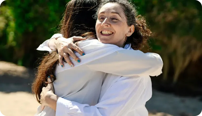 Warm embrace symbolizing support at Willow Behavioral's personalized mental health and addiction care program.