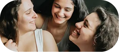 Women sharing a moment, highlighting ADHD's subtle symptoms and impact on women's lives.