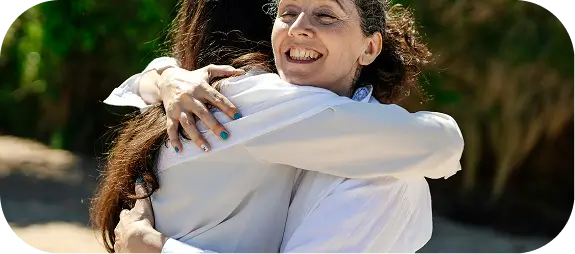 Supportive embrace symbolizing healing and recovery at Willow BH for PTSD and co-occurring disorders.