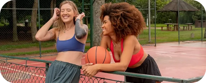 Friends enjoying outdoor basketball as part of ADHD lifestyle management.