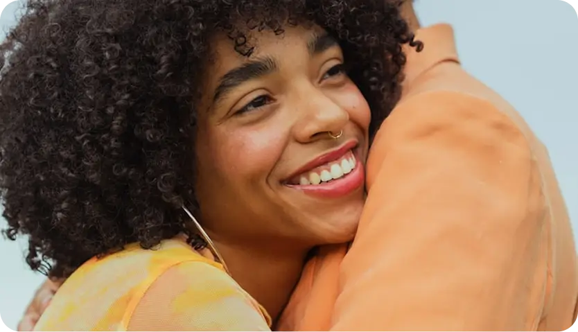 Supportive embrace symbolizing aftercare in mental health IOP program, promoting long-term healing support.