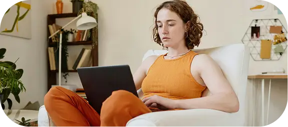 Person attending addiction therapy from home during virtual rehab in Madison, WI.