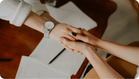 Supportive handshake representing compassionate mental health care at Willow Behavioral Health in Wisconsin.