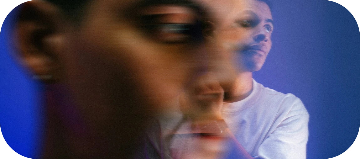 Blurred face symbolizing mood swings in bipolar disorder, reflecting manic and depressive phases.