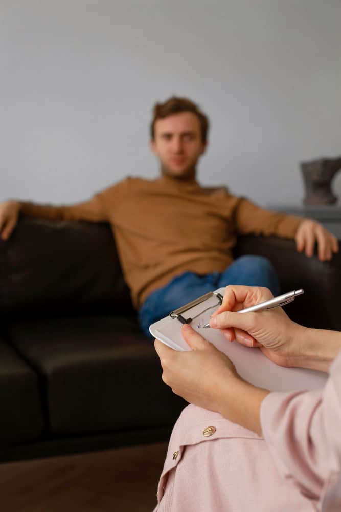 Front view man undergoing therapy
