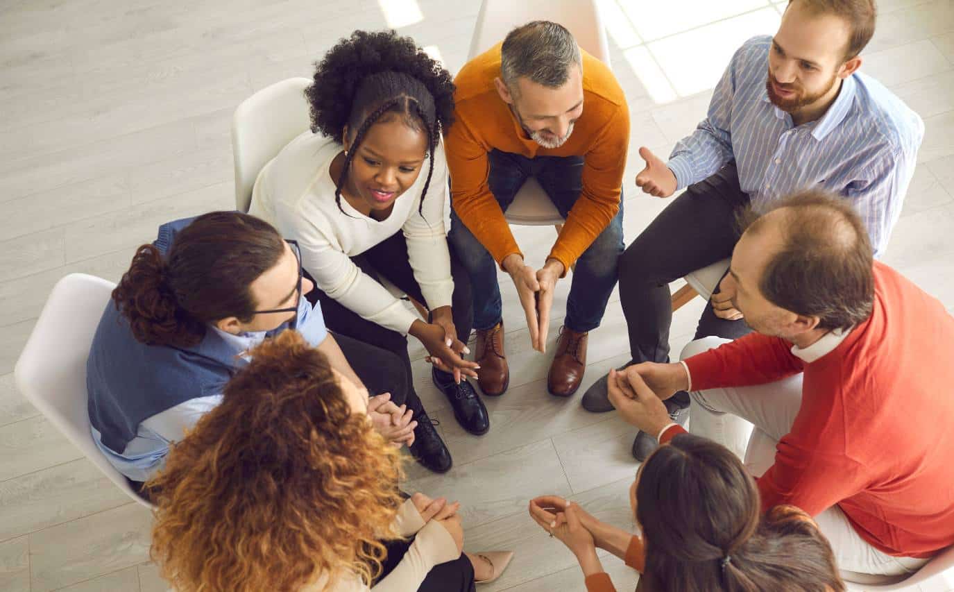 Adults participating in group therapy at PHP in Madison, WI.