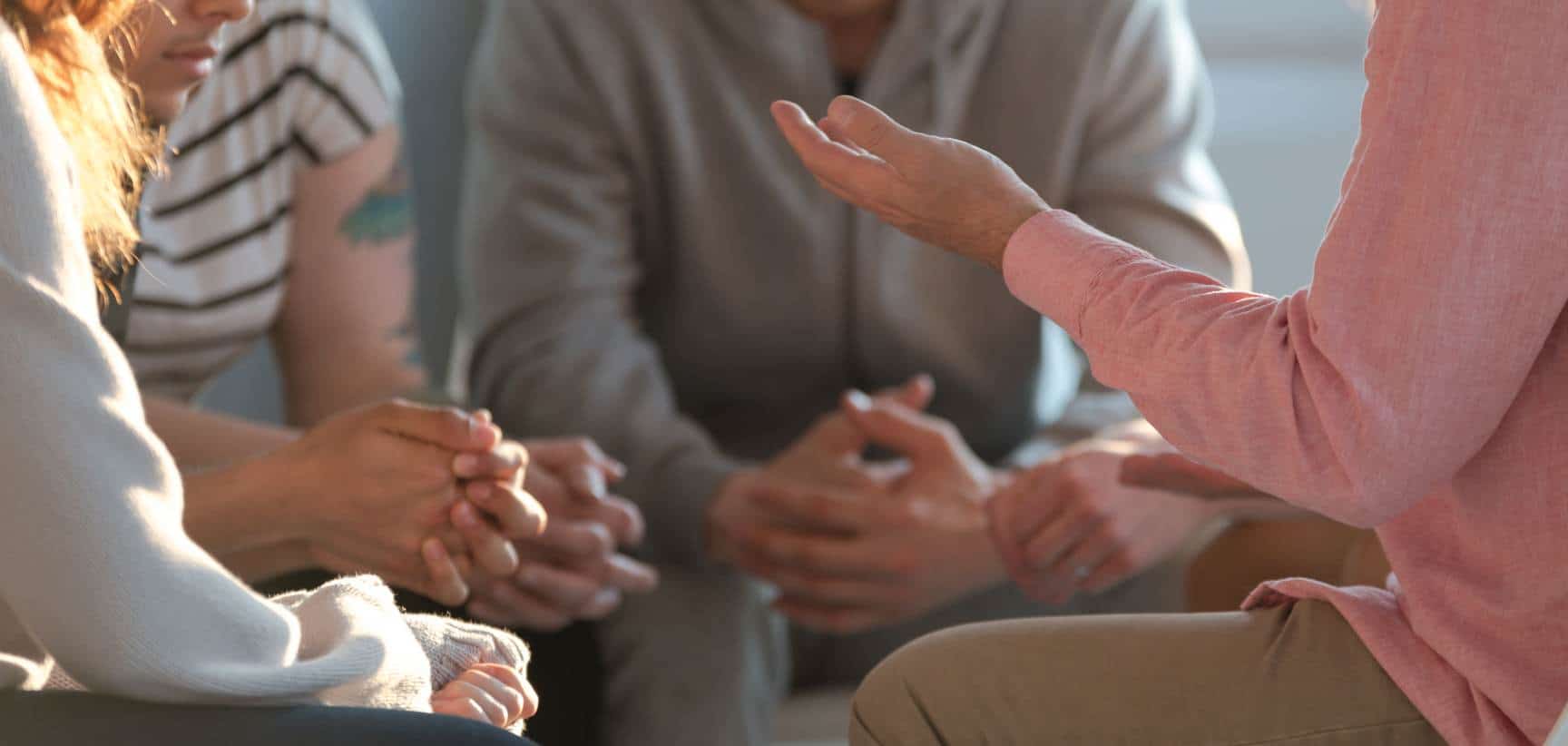 Group therapy session for addiction treatment in Madison, WI.