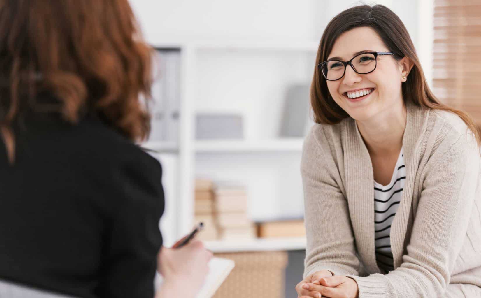 Woman looking comfortable while talking with a therapist during OCD treatment in Madison, WI.