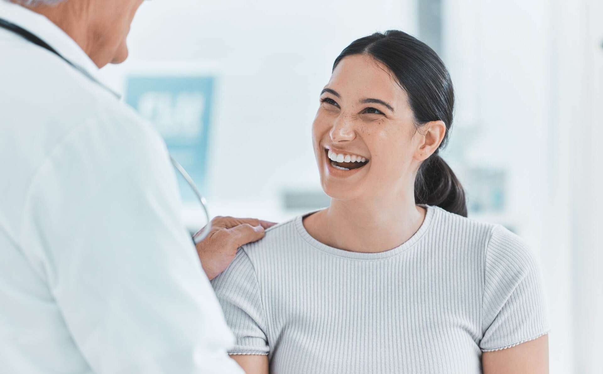 Woman smiling during medication-assisted treatment in Madison, WI.