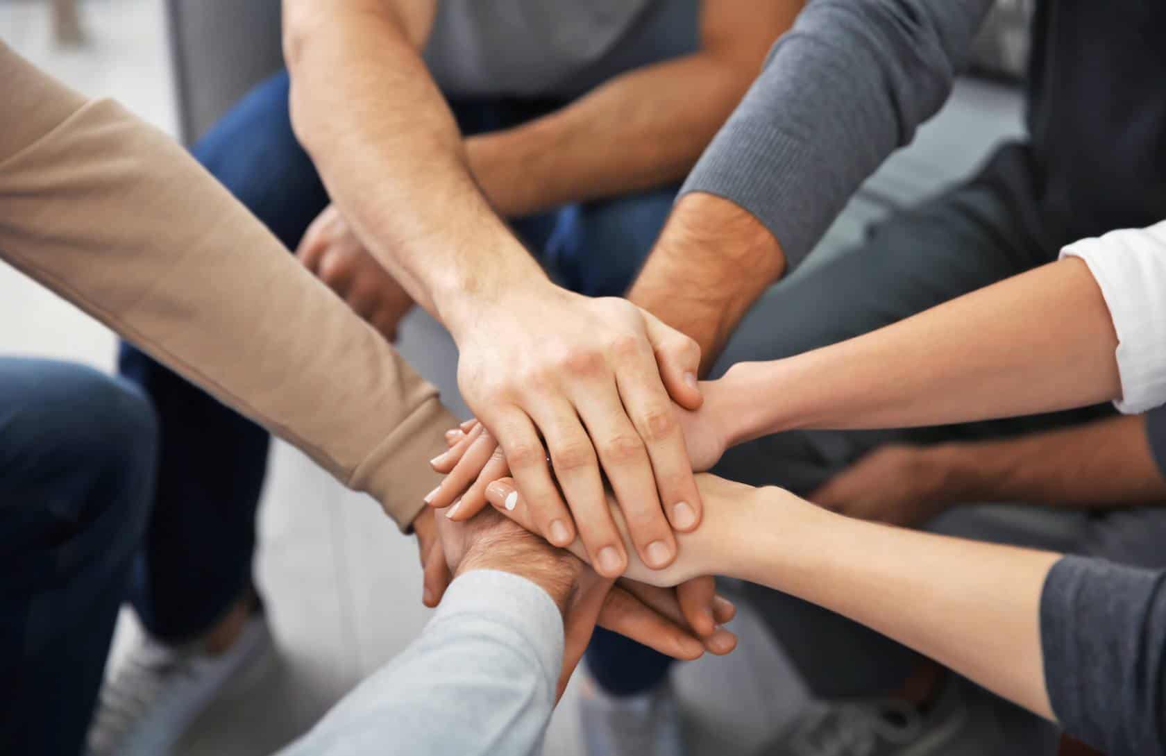 Group members supporting one another during borderline personality disorder treatment in Madison, WI.