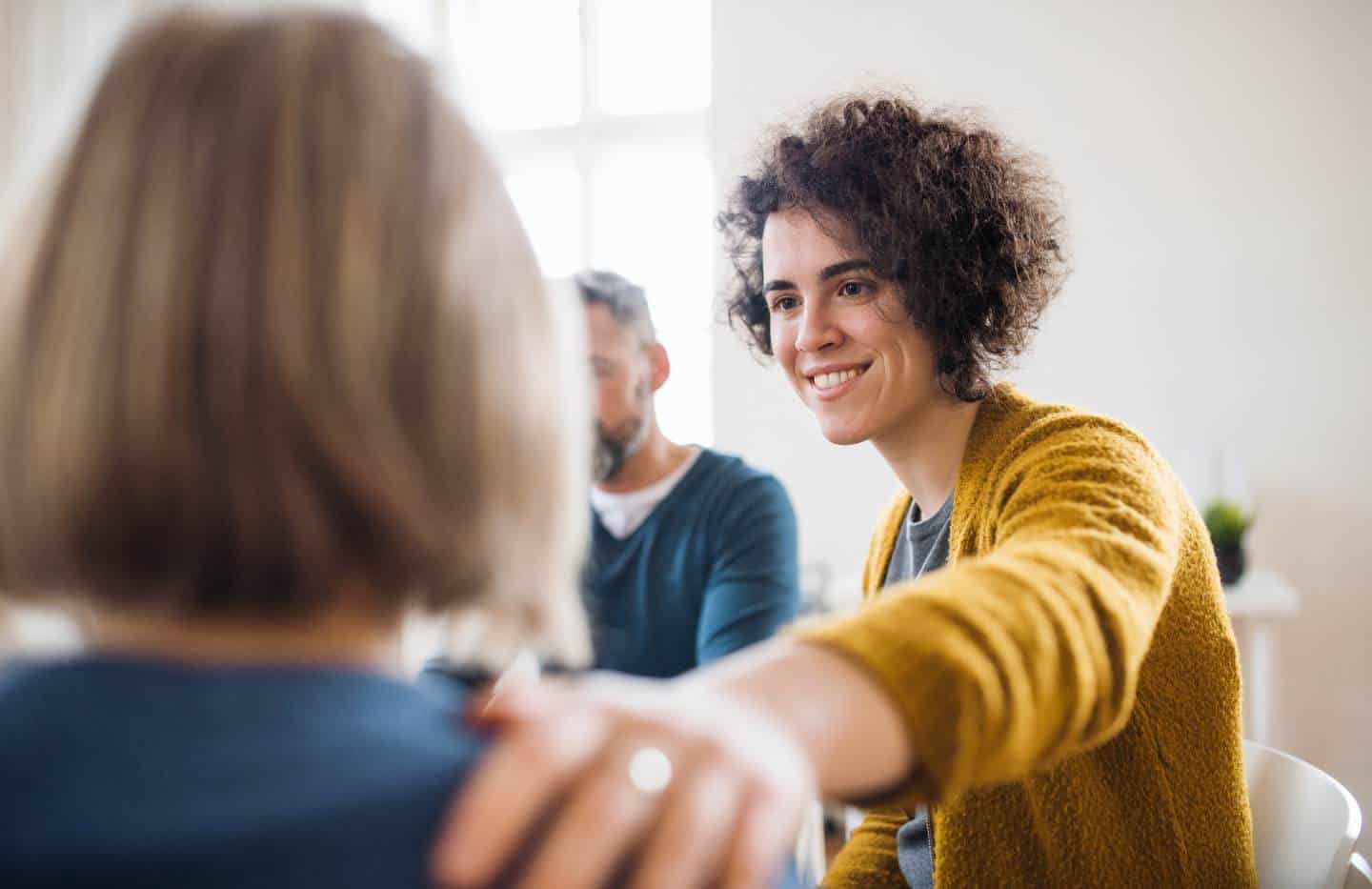 Supportive group session during MDMA addiction treatment in Madison, WI.