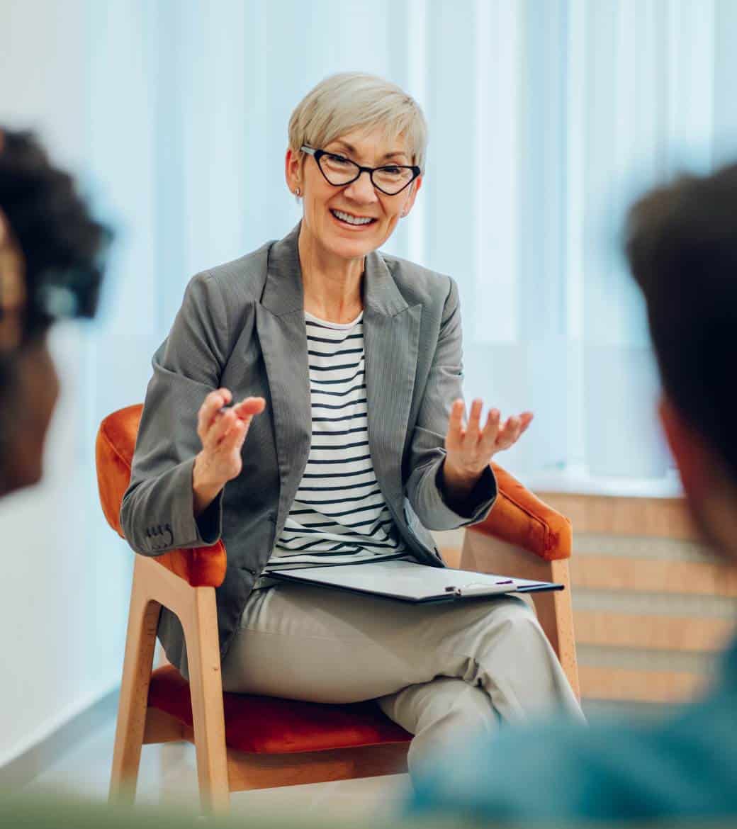 Therapist providing care during rehab for young adults in Madison, WI.