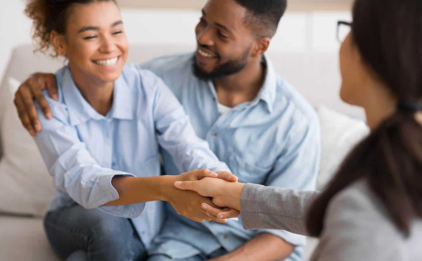 Couple meeting with a therapist during benzodiazepine addiction treatment in Madison, WI.
