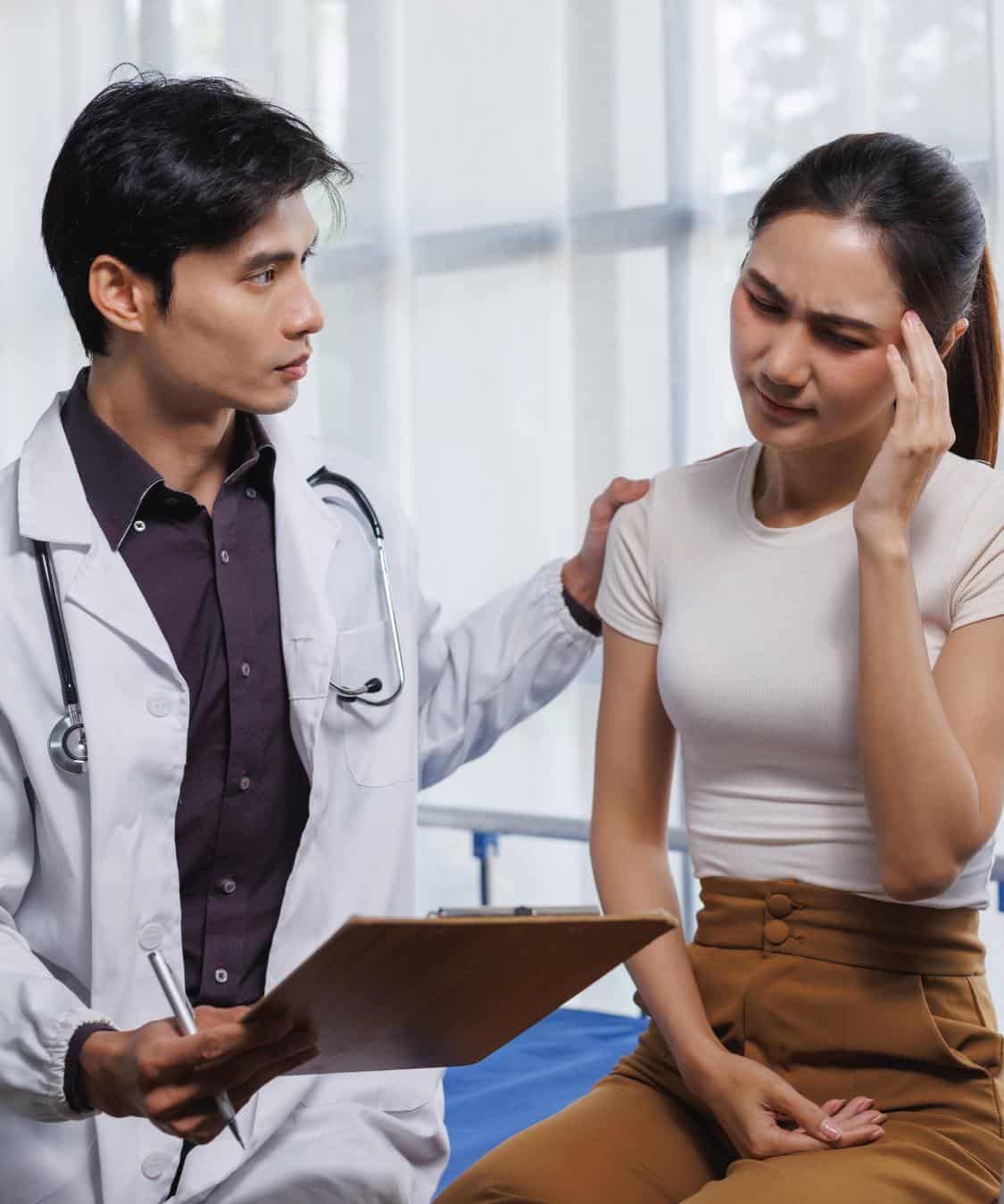 Woman receiving support from a doctor during marijuana addiction treatment in Madison, WI.