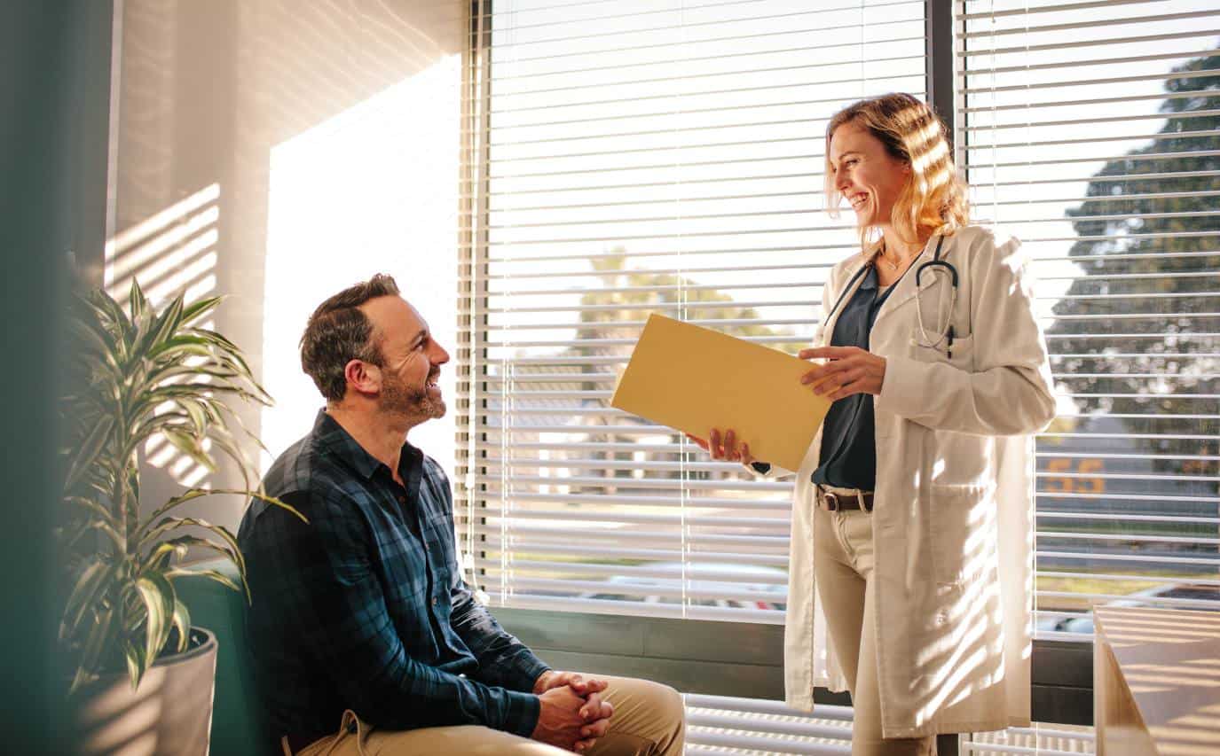 Healthcare provider supporting a client during meth addiction treatment in Madison, WI.