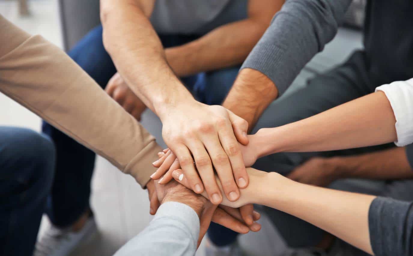 Recovery group connecting during meth addiction treatment in Madison, WI.