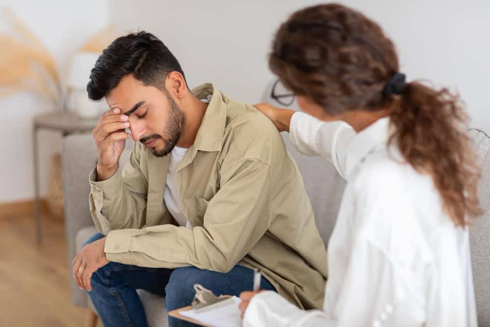 Man receiving support from a psychiatrist during opioid addiction treatment in Madison, WI at Willow Behavioral Health.
