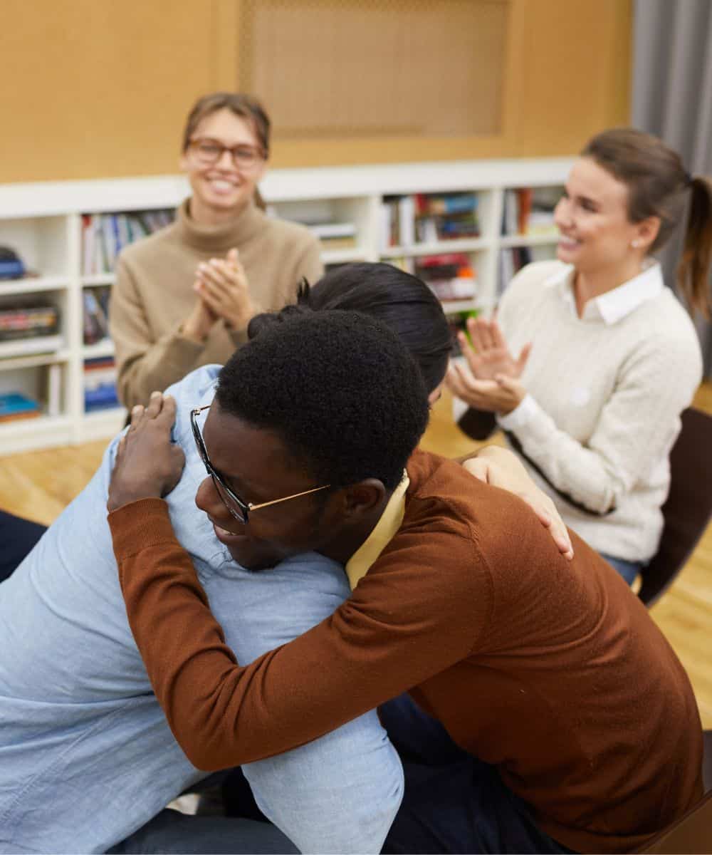 Group of students supporting each other during behavioral health treatment for students in Madison, WI.