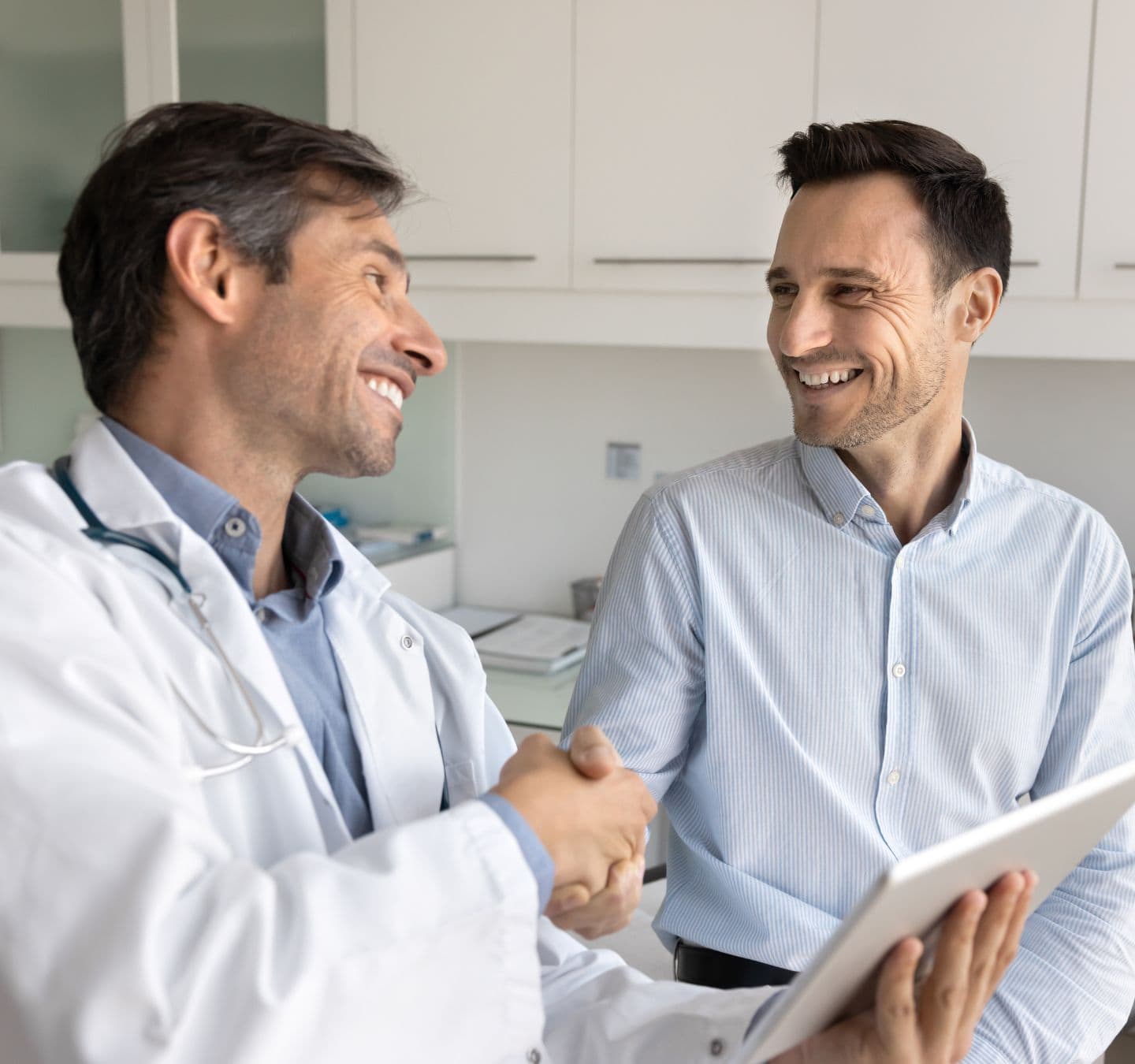 Man meeting with his doctor for medication management in Madison, WI.
