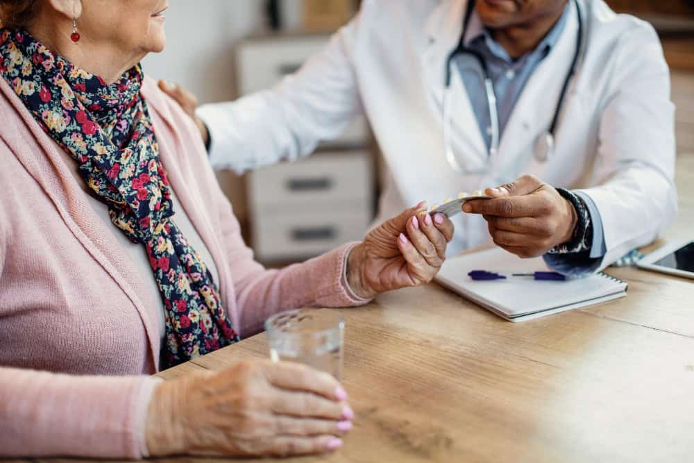 Doctor discussing prescription medication with a patient during prescription drug addiction treatment in Madison, WI at Willow Behavioral Health.