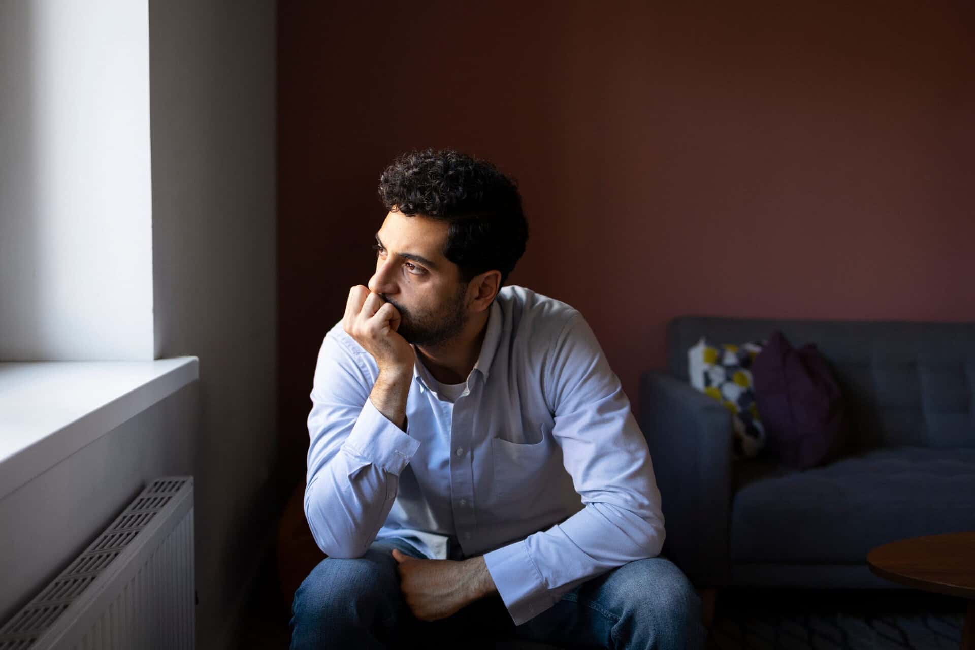 A man considers seeking treatment while wondering: "is it bipolar disorder or just mood swings?"